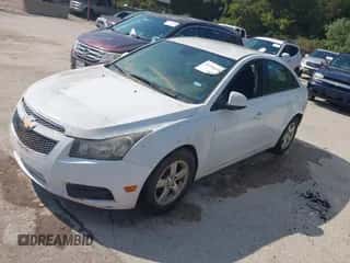 2013 Chevrolet Cruze 1LT z VIN 1G1PC5SBXD7299584, wystawiony jako IAAI lot #43336449 z przebiegiem 120 921 mil mil oraz . Historia ofert i sprzedaży dostępna na DreamBid. Obrazek 2.