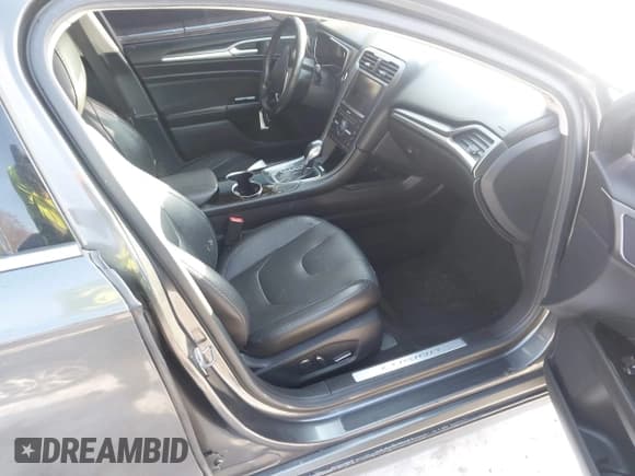 ✅ 2016 Ford Fusion Titanium • VIN: 3FA6P0K96GR300806 • Lot: 43837326. Listed on IAAI with 229,915 mi. Free auction sales archive from the USA and detailed vehicle history report at DreamBid. Image 5.