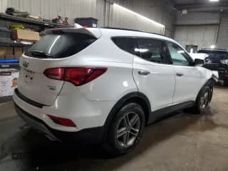 ✅ 2018 Hyundai Santa Fe 2.4L • VIN: 5NMZUDLBXJH089092 • Лот: 45015274. Опубликован ранее на Copart с пробегом 82 664 миль. Бесплатный доступ к архиву аукционных продаж из США и подробный отчёт об истории автомобиля на DreamBid. Изображение 3.