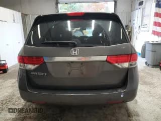 ✅ 2014 Honda Odyssey EX-L • VIN: 5FNRL5H60EB129661 • Лот: 90808905. Опубликован ранее на Copart с пробегом 128 012 миль. Бесплатный доступ к архиву аукционных продаж из США и подробный отчёт об истории автомобиля на DreamBid. Изображение 6.