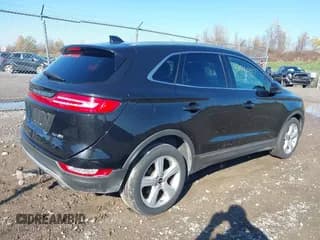 ✅ 2015 Lincoln MKC • VIN: 5LMCJ2A91FUJ44945 • Lot: 43490407. Listed on IAAI with 120,343 mi. Free auction sales archive from the USA and detailed vehicle history report at DreamBid. Image 4.