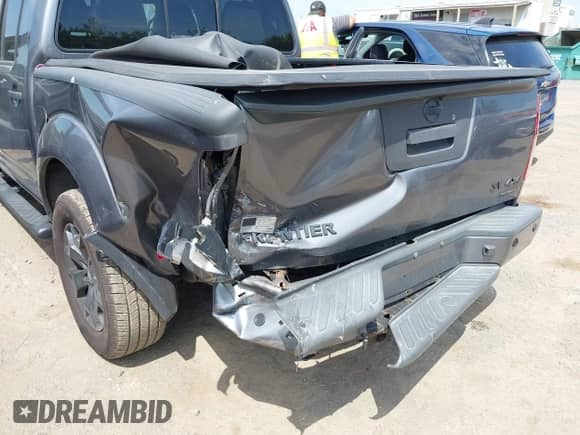 2020 Nissan Frontier SV with VIN 1N6ED0EB4LN726548, listed as a IAAI auction lot 42767637 with 64,100 mi miles and . Bid and sale history available at DreamBid. Image 17.