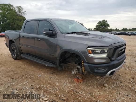 2020 Ram 1500 Rebel z VIN 1C6SRFLT2LN179065, wystawiony jako Copart lot #81848595 z przebiegiem 113 063 mil mil oraz Szkoda całkowita • Salvage title. Historia ofert i sprzedaży dostępna na DreamBid. Obrazek 4.