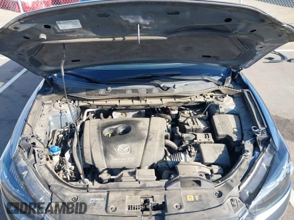 ✅ 2016 Mazda CX-5 Grand Touring • VIN: JM3KE4DY4G0916411 • Lot: 43258525. Wystawiony na IAAI z przebiegiem 48 743 mil. Bezpłatny archiwum sprzedaży aukcyjnych z USA i szczegółowy raport historii pojazdu na DreamBid. Zdjęcie 10.