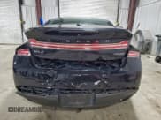 ✅ 2016 Lincoln MKZ • VIN: 3LN6L2G90GR611900 • Lot: 94377805. Wystawiony na Copart z przebiegiem 101 204 mil. Bezpłatny archiwum sprzedaży aukcyjnych z USA i szczegółowy raport historii pojazdu na DreamBid. Zdjęcie 6.