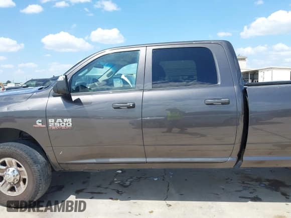 ✅ 2017 Ram 2500 Tradesman • VIN: 3C6UR5HL0HG616122 • Lot: 42433213. Listed on IAAI with 318,572 mi. Free auction sales archive from the USA and detailed vehicle history report at DreamBid. Image 14.
