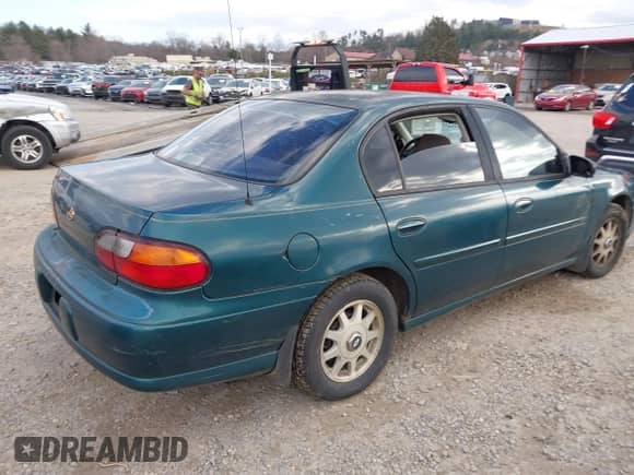 1999 Chevrolet Malibu LS with VIN 1G1NE52M1X6205394, listed as a IAAI auction lot 41514253 with 179,224 mi miles and . Bid and sale history available at DreamBid. Image 4.