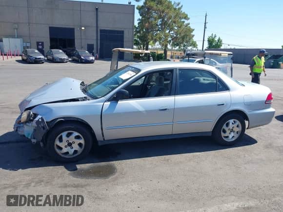 2001 Honda Accord VP with VIN 1HGCF86641A037216, listed as a IAAI auction lot 42766756 with 239,228 mi miles and . Bid and sale history available at DreamBid. Image 15.