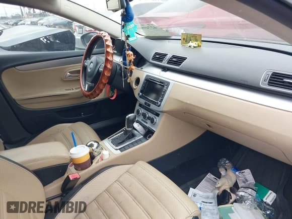 ✅ 2013 Volkswagen CC R-Line • VIN: WVWBP7AN6DE547662 • Lot: 42749969. Wystawiony na IAAI z przebiegiem 124 019 mil. Bezpłatny archiwum sprzedaży aukcyjnych z USA i szczegółowy raport historii pojazdu na DreamBid. Zdjęcie 5.