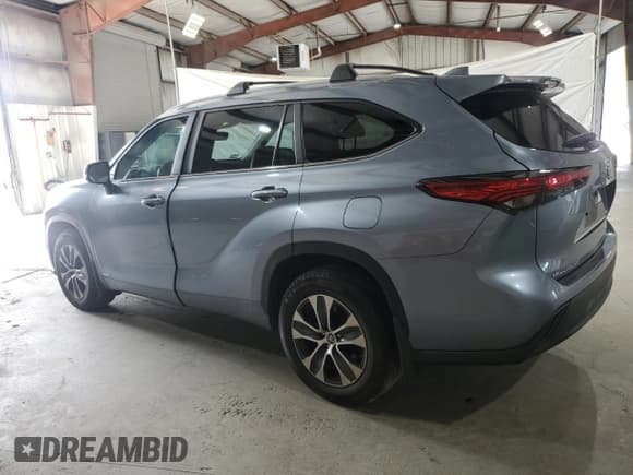 ✅ 2023 Toyota Highlander Hybrid XLE • VIN: 5TDKBRCH1PS106456 • Lot: 67240425. Listed on Copart with 295,759 mi. Free auction sales archive from the USA and detailed vehicle history report at DreamBid. Image 2.
