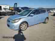 2012 Hyundai Accent SE with VIN KMHCU5AE3CU043488, listed as a Copart auction lot 87283305 with 136,528 mi miles and Salvage title. Bid and sale history available at DreamBid. Image 1.