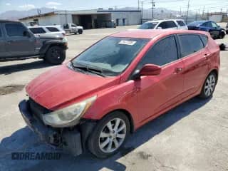 2012 Hyundai Accent SE with VIN KMHCU5AE7CU051559, listed as a Copart auction lot 71477235 with 142,397 mi miles and Salvage title. Bid and sale history available at DreamBid. Image 1.