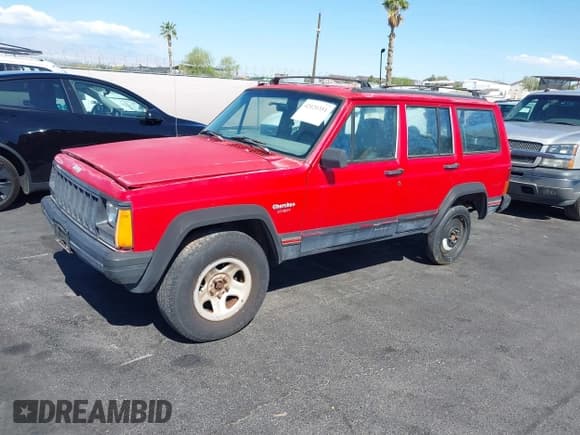 ✅ 1996 Jeep Cherokee Sport • VIN: 1J4FT68S0TL225719 • Lot: 42121351. Listed on IAAI with 237,602 mi. Free auction sales archive from the USA and detailed vehicle history report at DreamBid. Image 2.