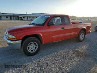 2002 Dodge Dakota SLT с VIN 1B7GL42N72S500329, выставлен на аукционе Copart как лот 75703164 с пробегом 159 391 миль миль и Списание • Salvage title. История ставок и продаж доступна на DreamBid. Изображение 1.