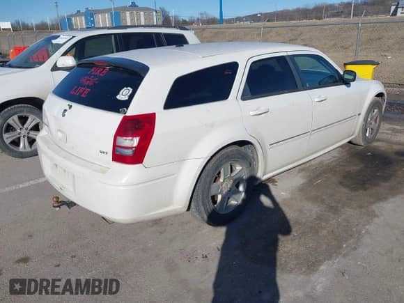 2006 Dodge Magnum с VIN 2D4FV47V36H435977, выставлен на аукционе IAAI как лот 41666378 с пробегом 290 999 миль миль и . История ставок и продаж доступна на DreamBid. Изображение 4.