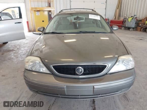 ✅ 2003 Mercury Sable LS Premium • VIN: 1MEHM59S73A620690 • Lot: 42740596. Listed on IAAI with 92,891 mi. Free auction sales archive from the USA and detailed vehicle history report at DreamBid. Image 6.