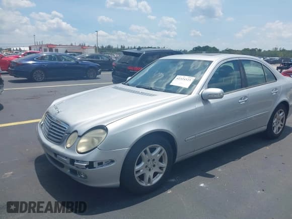 ✅ 2005 Mercedes-Benz E 320 • VIN: WDBUF65J95A641555 • Lot: 42324325. Listed on IAAI with 165,497 mi. Free auction sales archive from the USA and detailed vehicle history report at DreamBid. Image 2.