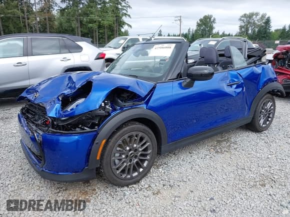 ✅ 2025 MINI Convertible Cooper S • VIN: WMW23GX01S2X08664 • Lot: 42506008. Listed on IAAI with 1,641 mi. Free auction sales archive from the USA and detailed vehicle history report at DreamBid. Image 2.