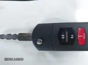 ✅ 2015 Mazda 5 Sport • VIN: JM1CW2BL7F0182965 • Lot: 43606712. Listed on IAAI with 150,777 mi. Free auction sales archive from the USA and detailed vehicle history report at DreamBid. Image 11.