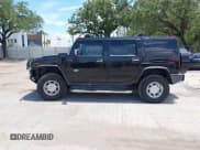 ✅ 2004 Hummer H2 • VIN: 5GRGN23U94H122582 • Lot: 42541864. Listed on IAAI with 105,764 mi. Free auction sales archive from the USA and detailed vehicle history report at DreamBid. Image 14.