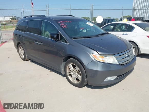 ✅ 2012 Honda Odyssey Touring • VIN: 5FNRL5H97CB501620 • Лот: 43005068. Опубликован ранее на IAAI с пробегом 160 233 миль. Бесплатный доступ к архиву аукционных продаж из США и подробный отчёт об истории автомобиля на DreamBid. Изображение 1.
