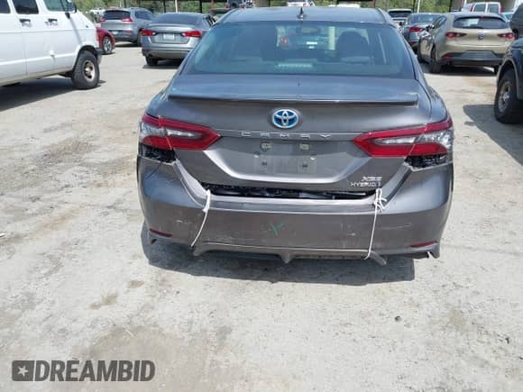 2021 Toyota Camry Hybrid XSE with VIN 4T1K31AK2MU559887, listed as a IAAI auction lot 42487632 with 24,069 mi miles and . Bid and sale history available at DreamBid. Image 6.