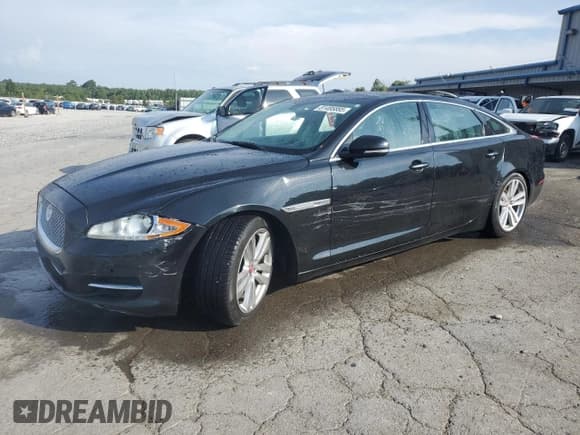 ✅ 2014 Jaguar XJ Portfolio • VIN: SAJWA2GZ1E8V61311 • Lot: 81485885. Listed on Copart with 133,168 mi. Free auction sales archive from the USA and detailed vehicle history report at DreamBid. Image 1.