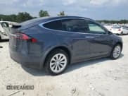 ✅ 2017 Tesla Model X 90D • VIN: 5YJXCDE23HF044191 • Lot: 70591435. Wystawiony na Copart z przebiegiem 103 208 mil. Bezpłatny archiwum sprzedaży aukcyjnych z USA i szczegółowy raport historii pojazdu na DreamBid. Zdjęcie 3.