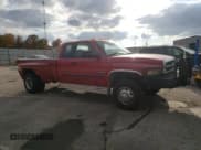 ✅ 2002 Dodge 3500 • VIN: 3B7MF33652M205850 • Lot: 76749504. Listed on Copart with 220,734 mi. Free auction sales archive from the USA and detailed vehicle history report at DreamBid. Image 4.