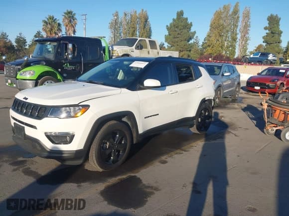 ✅ 2021 Jeep Compass Latitude • VIN: 3C4NJDBB1MT561812 • Lot: 43504011. Listed on IAAI with 52,583 mi. Free auction sales archive from the USA and detailed vehicle history report at DreamBid. Image 2.