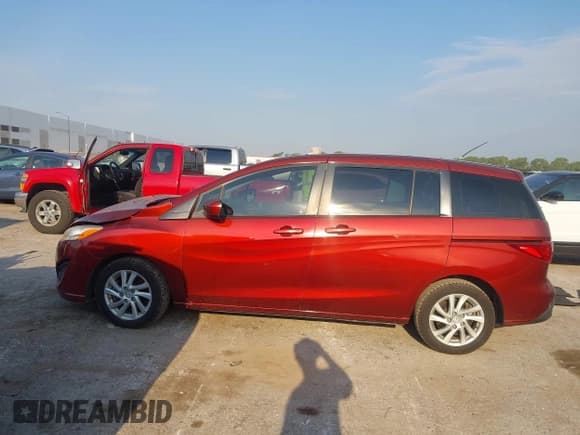 ✅ 2012 Mazda 5 Sport • VIN: JM1CW2BL1C0137919 • Лот: 43064242. Опубликован ранее на IAAI с пробегом 194 529 миль. Бесплатный доступ к архиву аукционных продаж из США и подробный отчёт об истории автомобиля на DreamBid. Изображение 14.