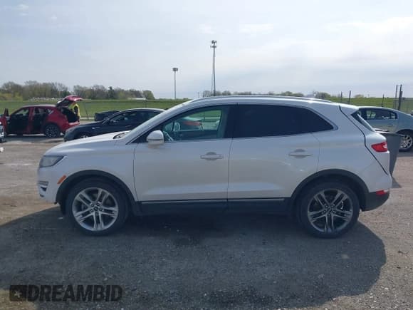 ✅ 2015 Lincoln MKC • VIN: 5LMTJ2AH9FUJ33473 • Lot: 42023741. Wystawiony na IAAI z przebiegiem 148 839 mil. Bezpłatny archiwum sprzedaży aukcyjnych z USA i szczegółowy raport historii pojazdu na DreamBid. Zdjęcie 14.