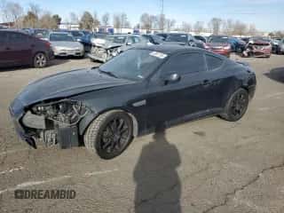 2008 Hyundai Tiburon GS z VIN KMHHM66D38U264513, wystawiony jako Copart lot #42861755 z przebiegiem 187 895 mil mil oraz Szkoda całkowita • Salvage title. Historia ofert i sprzedaży dostępna na DreamBid. Obrazek 1.