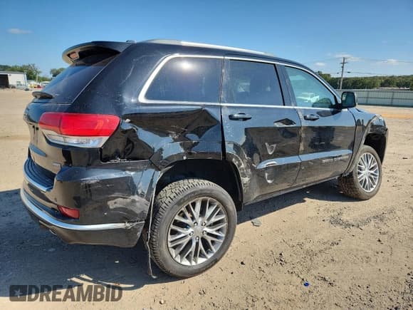 ✅ 2018 Jeep Grand Cherokee Summit • VIN: 1C4RJFJG4JC506708 • Lot: 82303345. Listed on Copart with 104,788 mi. Free auction sales archive from the USA and detailed vehicle history report at DreamBid. Image 3.