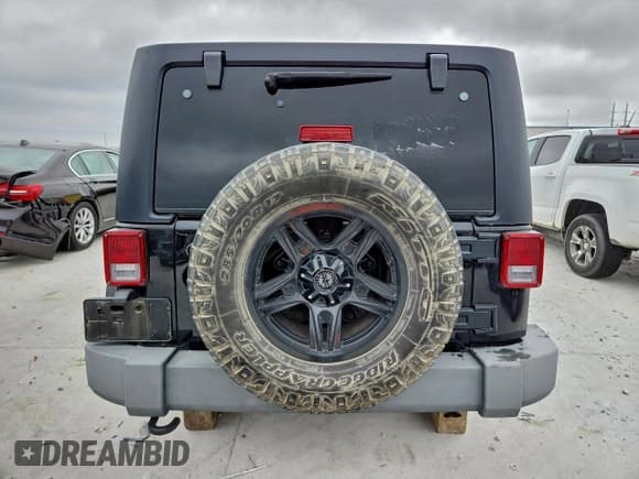✅ 2014 Jeep Wrangler Unlimited Sport • VIN: 1C4BJWDG6EL245178 • Лот: 95471365. Опубликован ранее на Copart с пробегом 150 766 миль. Бесплатный доступ к архиву аукционных продаж из США и подробный отчёт об истории автомобиля на DreamBid. Изображение 6.