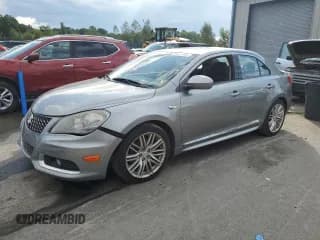✅ 2011 Suzuki Kizashi GTS Sport • VIN: JS2RF9A65B6110044 • Лот: 66925444. Опубликован ранее на Copart с пробегом Не указан. Бесплатный доступ к архиву аукционных продаж из США и подробный отчёт об истории автомобиля на DreamBid. Изображение 1.