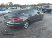 ✅ 2019 Ford Fusion SE • VIN: 3FA6P0HD4KR235121 • Lot: 43466867. Listed on IAAI with 100,480 mi. Free auction sales archive from the USA and detailed vehicle history report at DreamBid. Image 4.