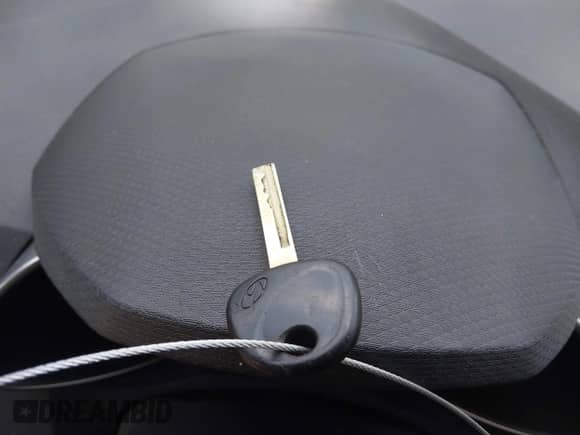 2012 Hyundai Veloster w/Black Int with VIN KMHTC6AD3CU078547, listed as a IAAI auction lot 42633915 with 143,633 mi miles and . Bid and sale history available at DreamBid. Image 11.