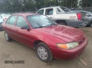 ✅ 1998 Ford Escort LX • VIN: 1FAFP10P4WW140458 • Lot: 37094590. Listed on IAAI with 216,895 mi. Free auction sales archive from the USA and detailed vehicle history report at DreamBid. Image 1.