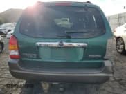 ✅ 2001 Mazda Tribute LX • VIN: 4F2YU09101KM05395 • Lot: 82409584. Wystawiony na Copart z przebiegiem 253 210 mil. Bezpłatny archiwum sprzedaży aukcyjnych z USA i szczegółowy raport historii pojazdu na DreamBid. Zdjęcie 6.