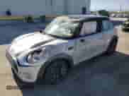 2017 MINI Hardtop Cooper with VIN WMWXP5C34H2F61072, listed as a Copart auction lot 57314695 with 46,693 mi miles and Salvage title. Bid and sale history available at DreamBid. Image 1.