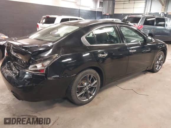 2012 Nissan Maxima S z VIN 1N4AA5AP9CC863172, wystawiony jako IAAI lot #42120073 z przebiegiem 102 500 mil mil oraz . Historia ofert i sprzedaży dostępna na DreamBid. Obrazek 4.