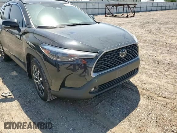 ✅ 2023 Toyota Corolla Cross XLE • VIN: 7MUDAABG9PV076750 • Лот: 51434765. Опубликован ранее на Copart с пробегом Не указан. Бесплатный доступ к архиву аукционных продаж из США и подробный отчёт об истории автомобиля на DreamBid. Изображение 11.