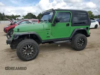 ✅ 2003 Jeep Wrangler Sahara • VIN: 1J4FA59S13P343091 • Lot: 83814095. Listed on Copart with 65,472 mi. Free auction sales archive from the USA and detailed vehicle history report at DreamBid. Image 1.