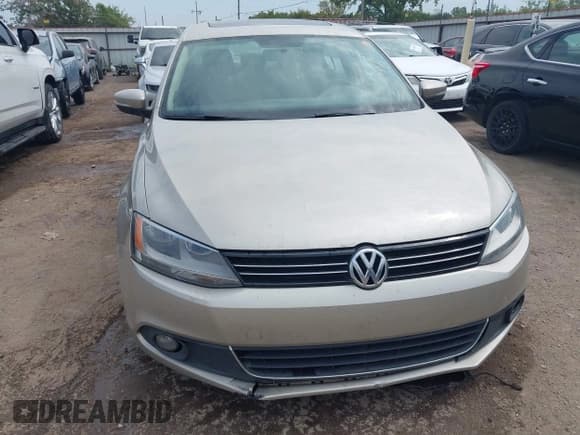 ✅ 2013 Volkswagen Jetta TDI w/Premium/Nav • VIN: 3VWLL7AJ9DM234271 • Lot: 43247645. Listed on IAAI with 176,566 mi. Free auction sales archive from the USA and detailed vehicle history report at DreamBid. Image 12.