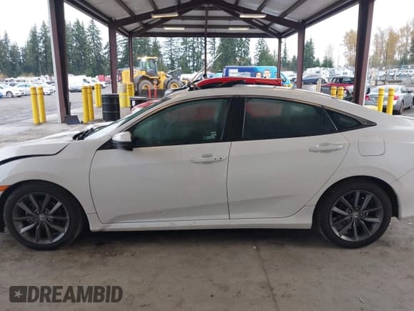 ✅ 2020 Honda Civic EX • VIN: 19XFC1F35LE220142 • Лот: 43701339. Опубликован ранее на IAAI с пробегом 63 710 миль. Бесплатный доступ к архиву аукционных продаж из США и подробный отчёт об истории автомобиля на DreamBid. Изображение 14.