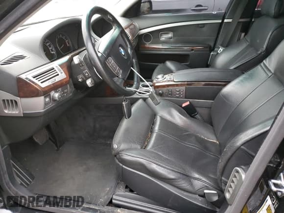 ✅ 2006 BMW 7 Series 760Li • VIN: WBAHN03566DD98392 • Лот: 75042494. Опубликован ранее на Copart с пробегом 179 236 миль. Бесплатный доступ к архиву аукционных продаж из США и подробный отчёт об истории автомобиля на DreamBid. Изображение 7.