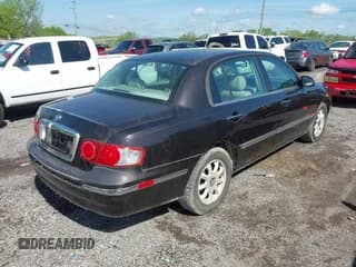 ✅ 2004 Kia Amanti • VIN: KNALD124345048430 • Lot: 42051694. Listed on IAAI with 224,457 mi. Free auction sales archive from the USA and detailed vehicle history report at DreamBid. Image 4.