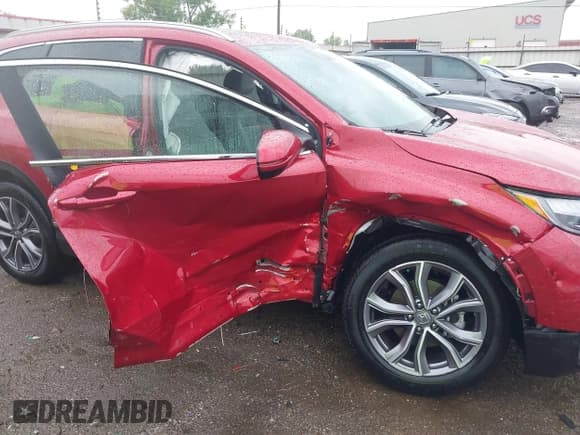 ✅ 2021 Honda CR-V Touring • VIN: 2HKRW2H9XMH663315 • Lot: 42188893. Listed on IAAI with 26,203 mi. Free auction sales archive from the USA and detailed vehicle history report at DreamBid. Image 6.
