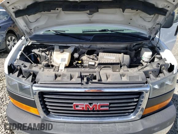 ✅ 2018 GMC Savana Cargo • VIN: 1GTW7AFG9J1902027 • Лот: 50590465. Опубликован ранее на Copart с пробегом 128 914 миль. Бесплатный доступ к архиву аукционных продаж из США и подробный отчёт об истории автомобиля на DreamBid. Изображение 12.